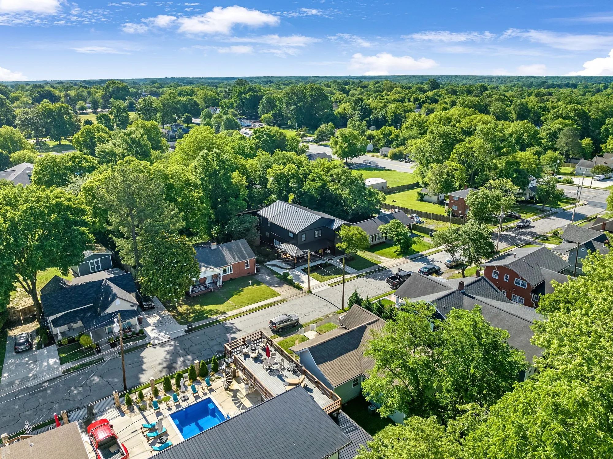 Aerial view of tree-lined Martin Street homes in Greensboro